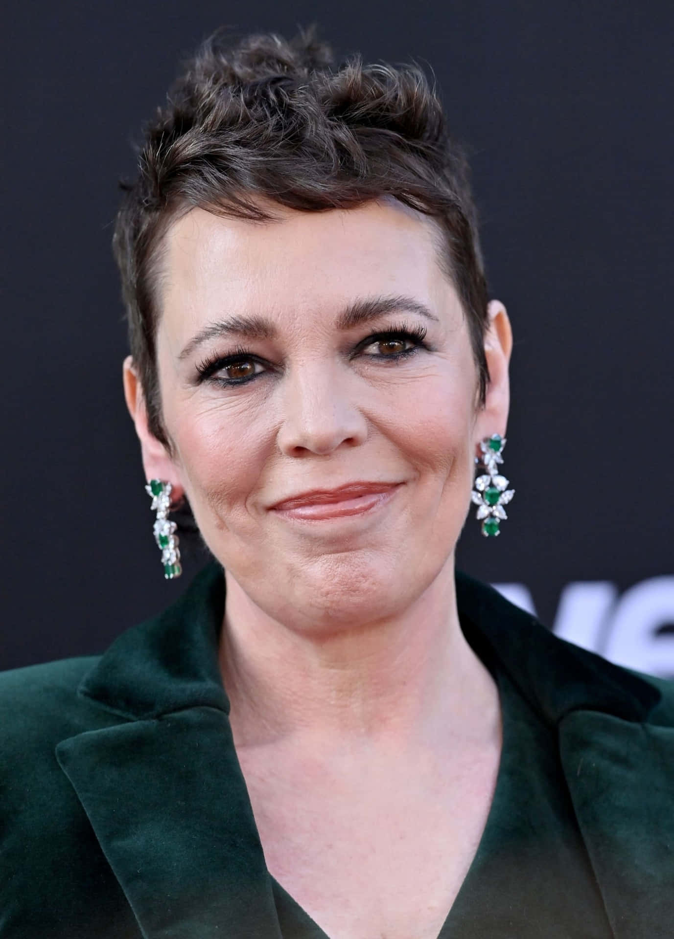 Olivia Colman Looking Elegantly Royal In Portrait Background