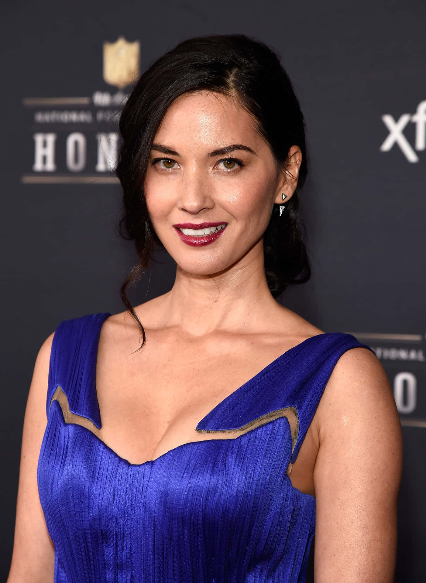 Olivia Munn Blue Dress Event Background