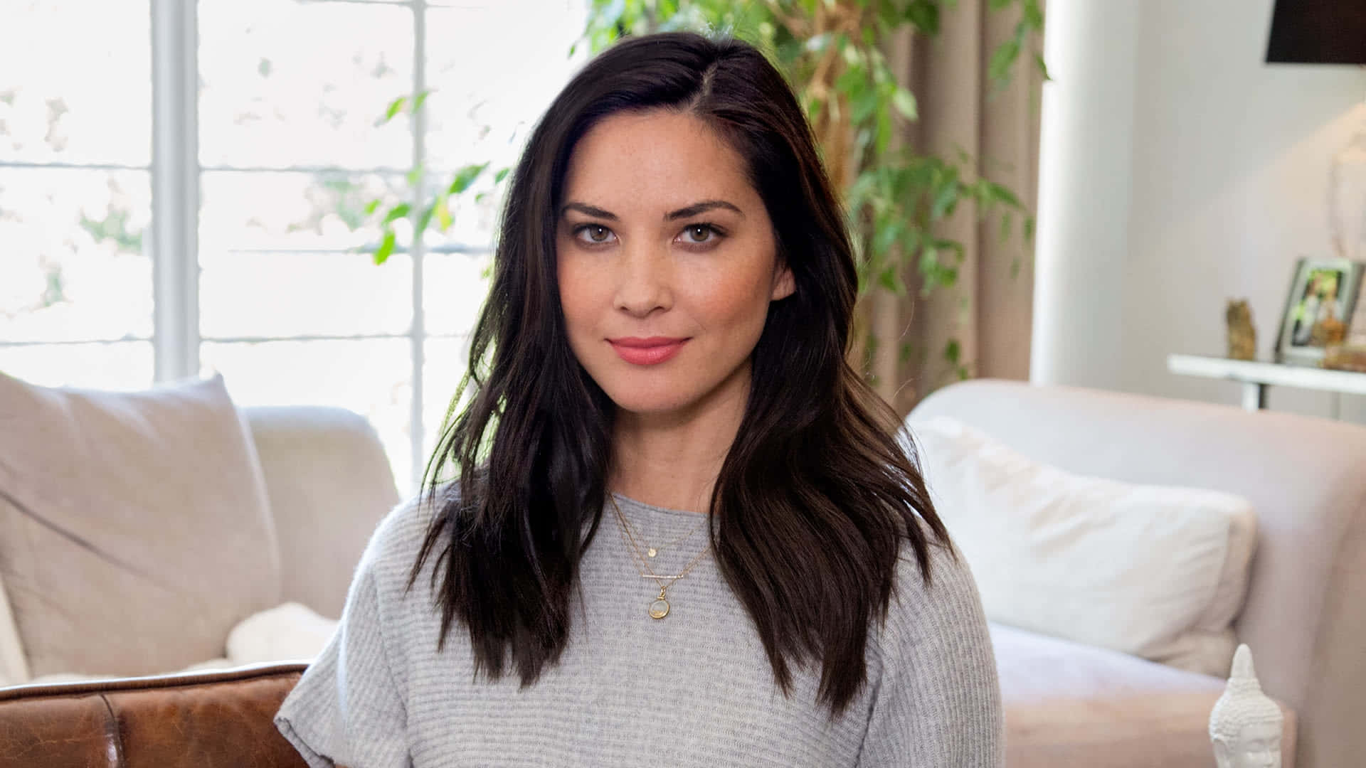 Olivia Munn Relaxed Home Setting Background