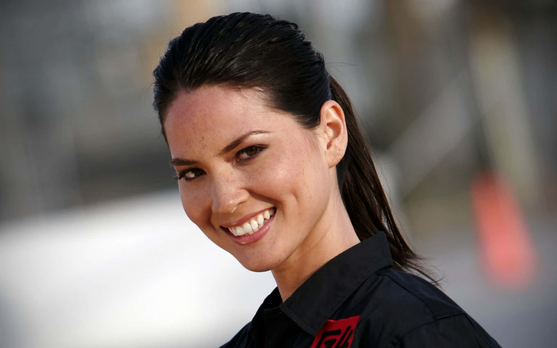 Olivia Munn Smiling Outdoors Background