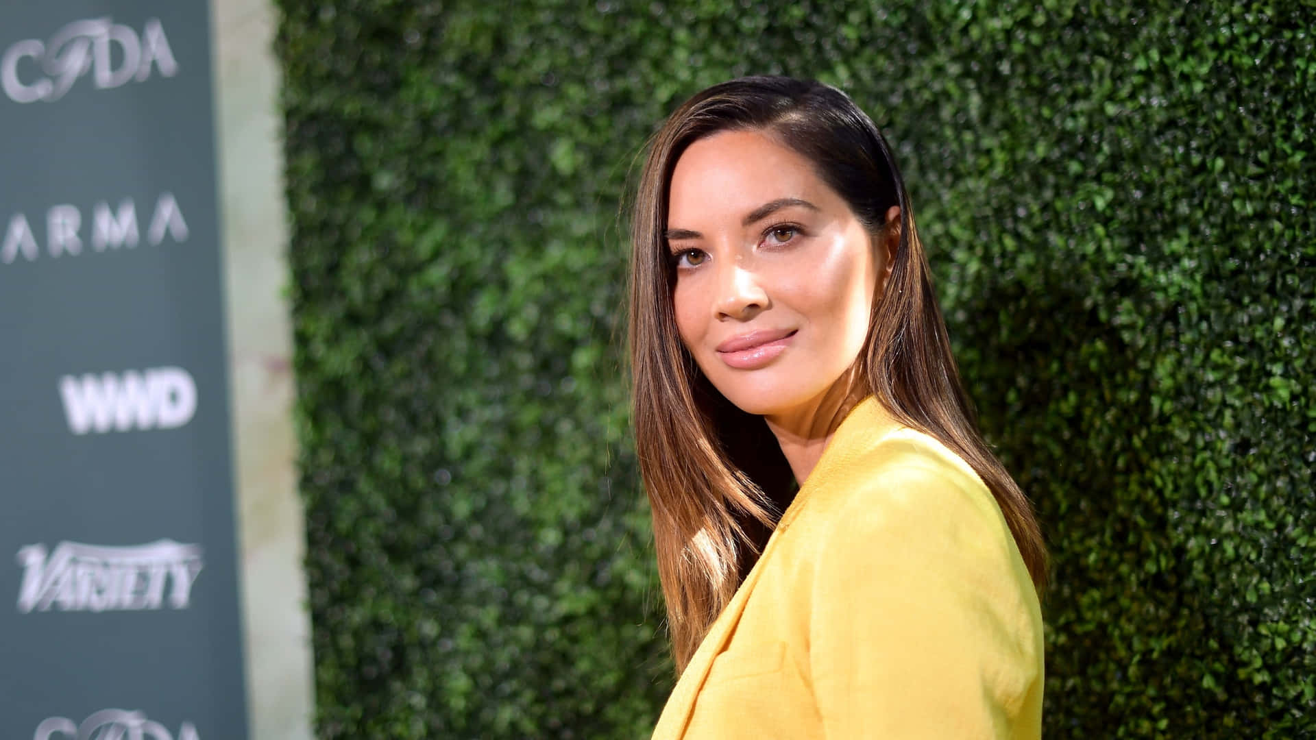 Olivia Munn Yellow Blazer Event Background