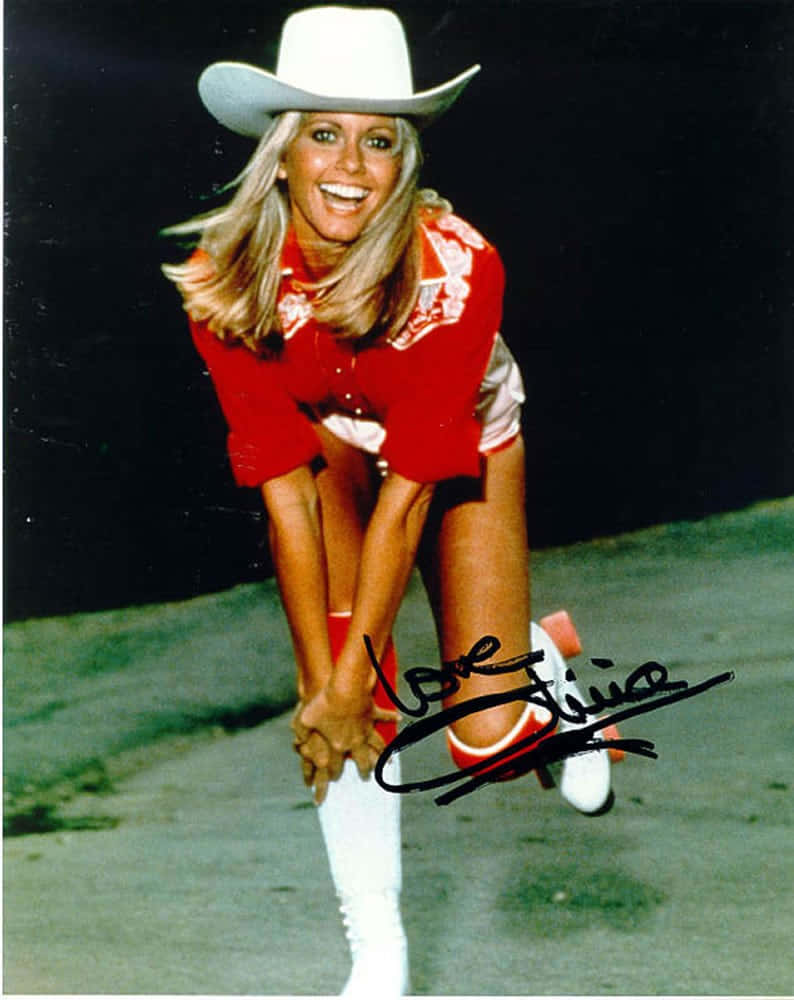 Olivia Newton John On Roller Skates Background
