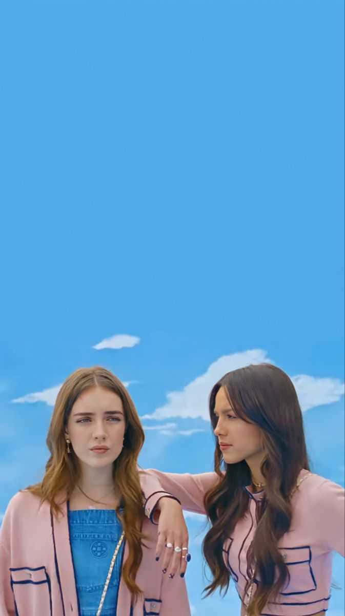 Olivia Rodrigo Radiates Beauty And Confidence In A Purple Flowy Dress.