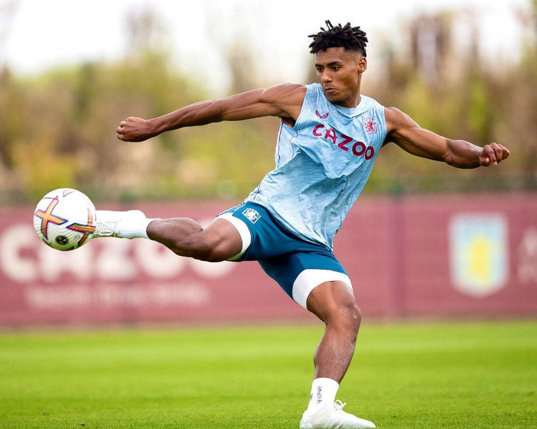 Ollie Watkins Kicking The Soccer Ball Background