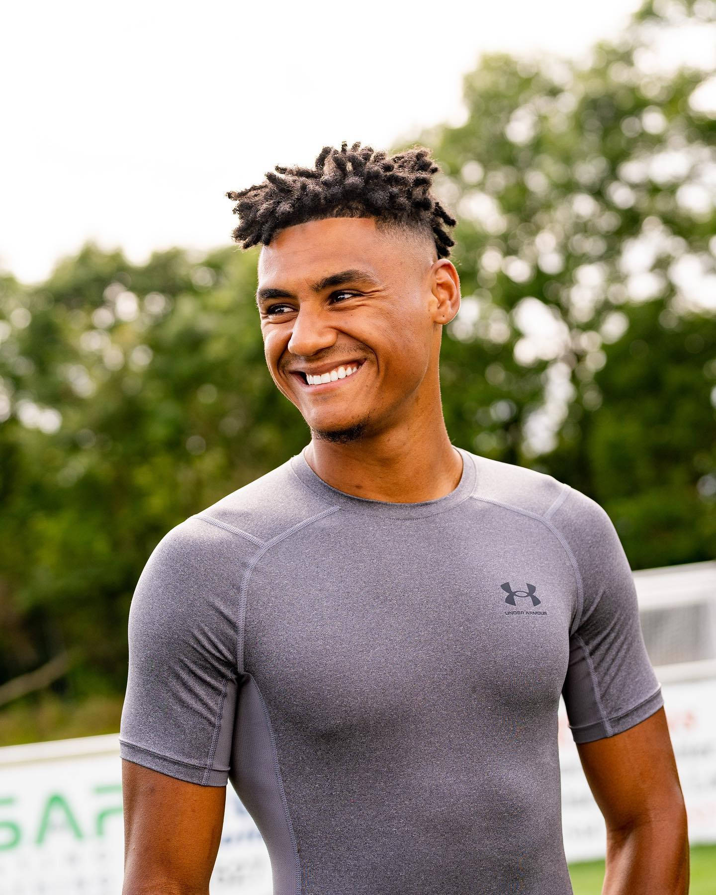 Ollie Watkins Sporting A Trendy Grey Shirt