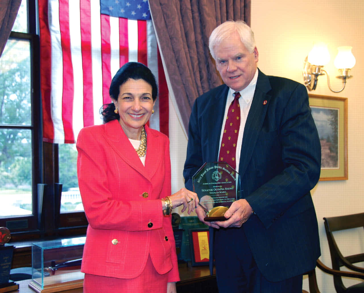 Olympia Snowe Receiving Prestigious Glass Award Background