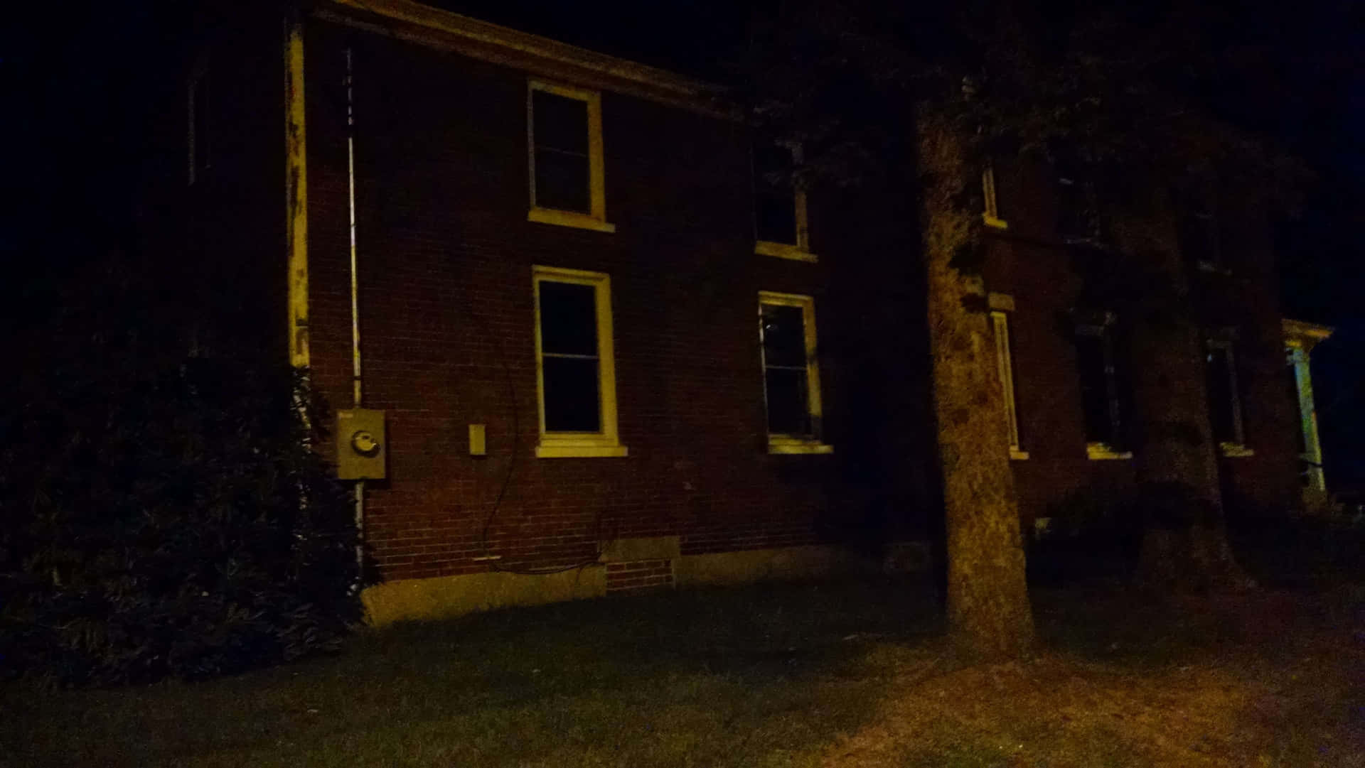 Ominous House Exterior At Night