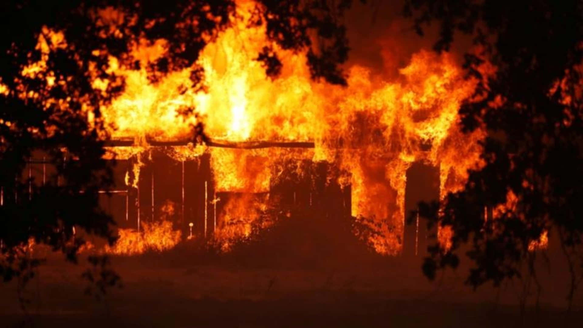 Ominous Photo Of A Fire Background