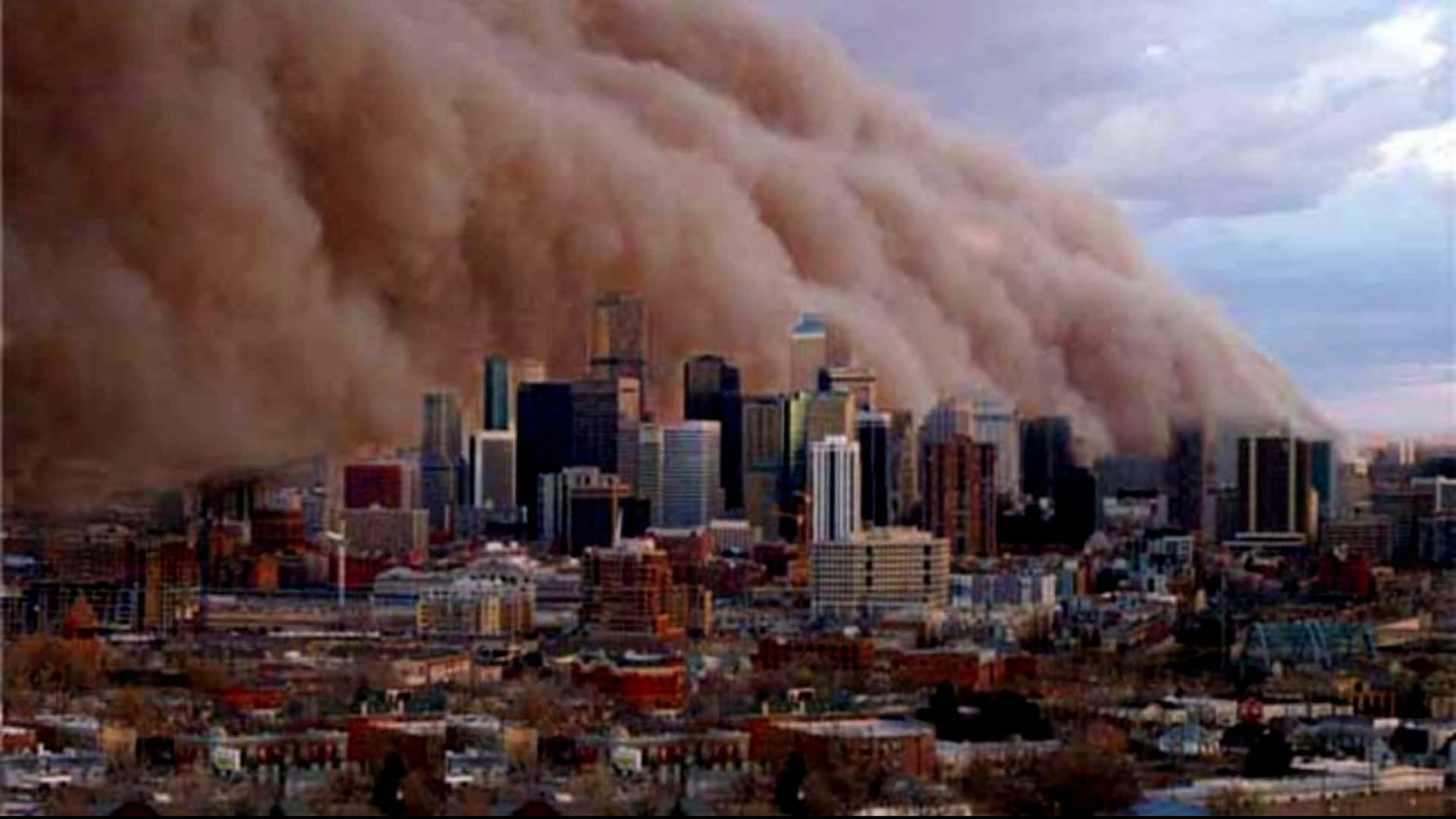 Ominous Smoke Swallowing The City Background