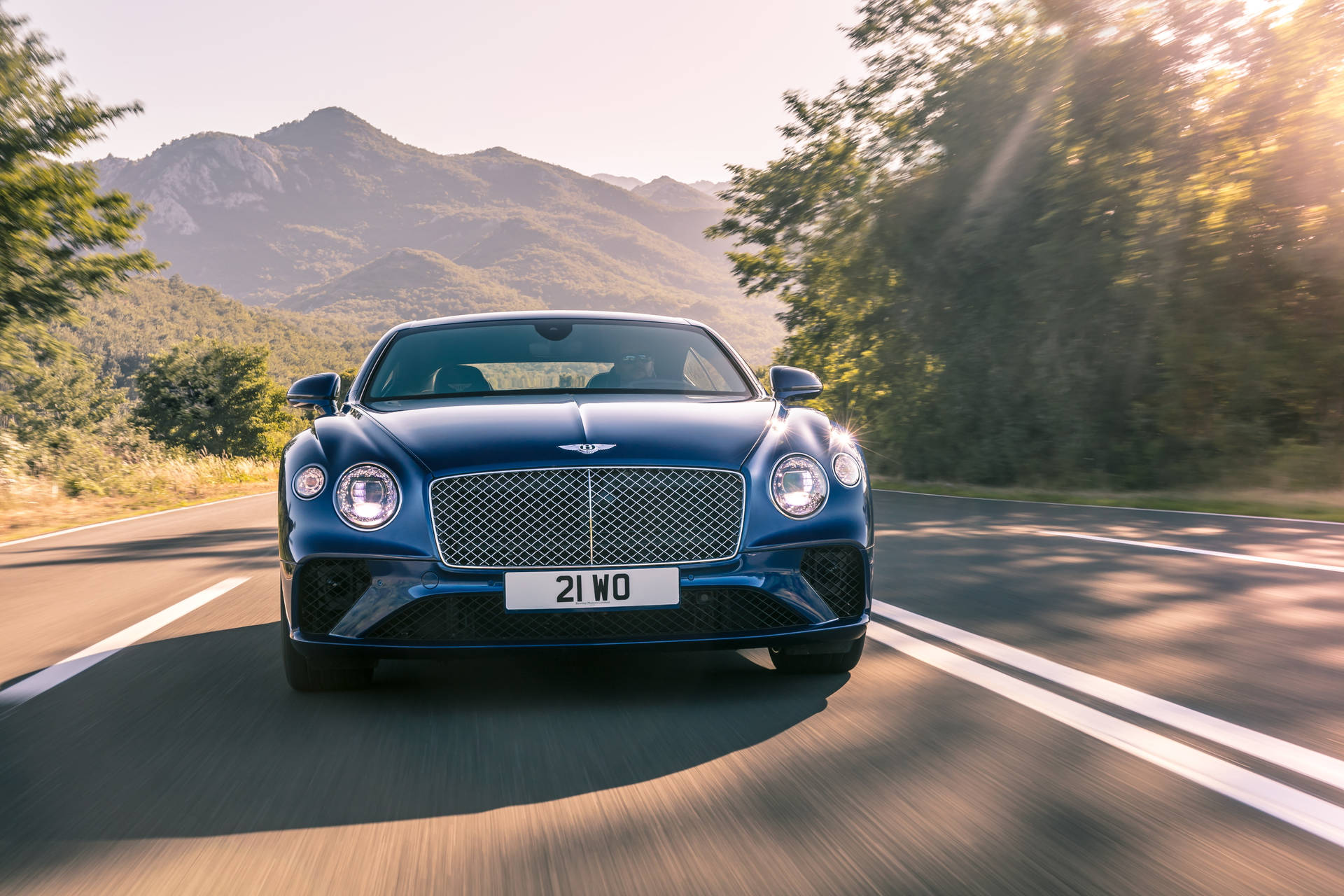 On The Road Blue Bentley Cars Background