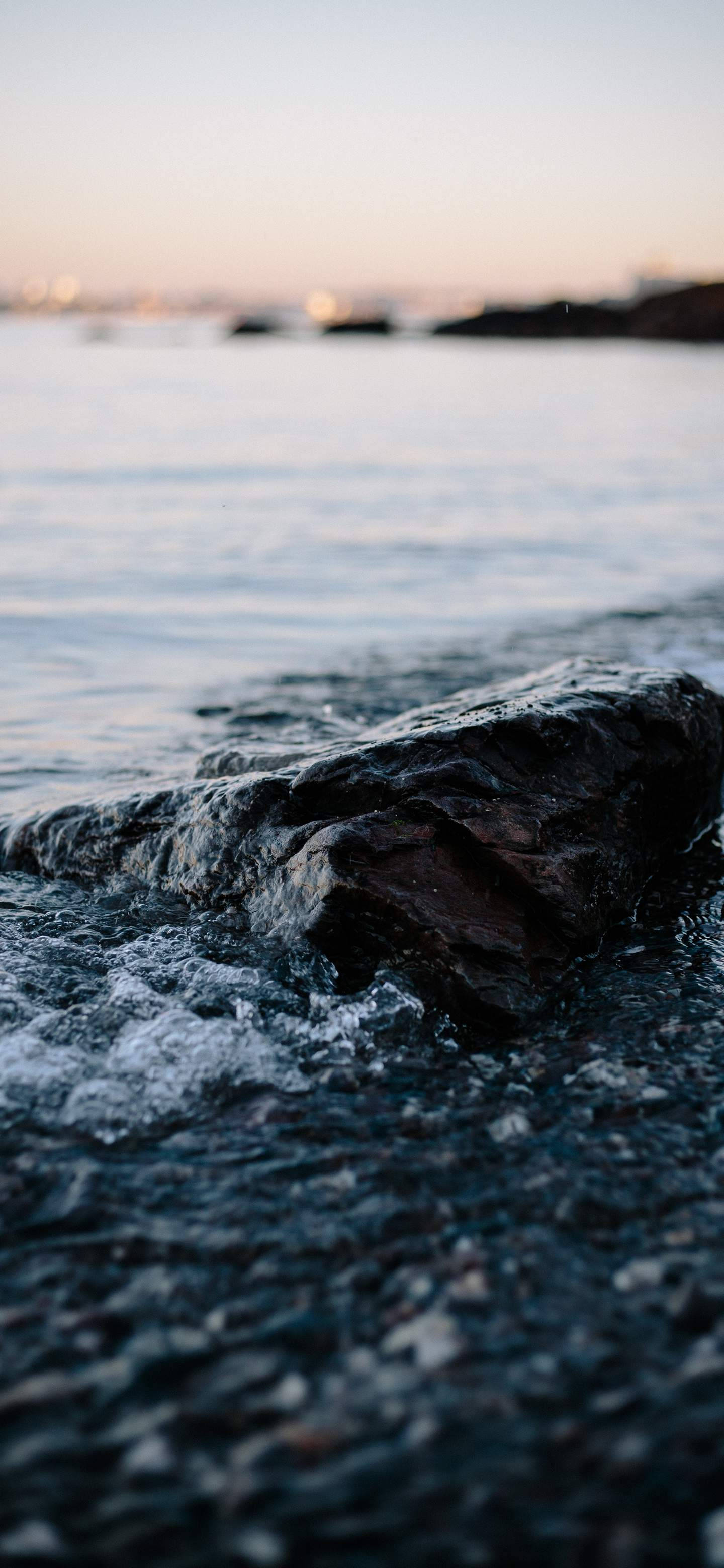 Oneplus 7 Pro Rock On Beach Background