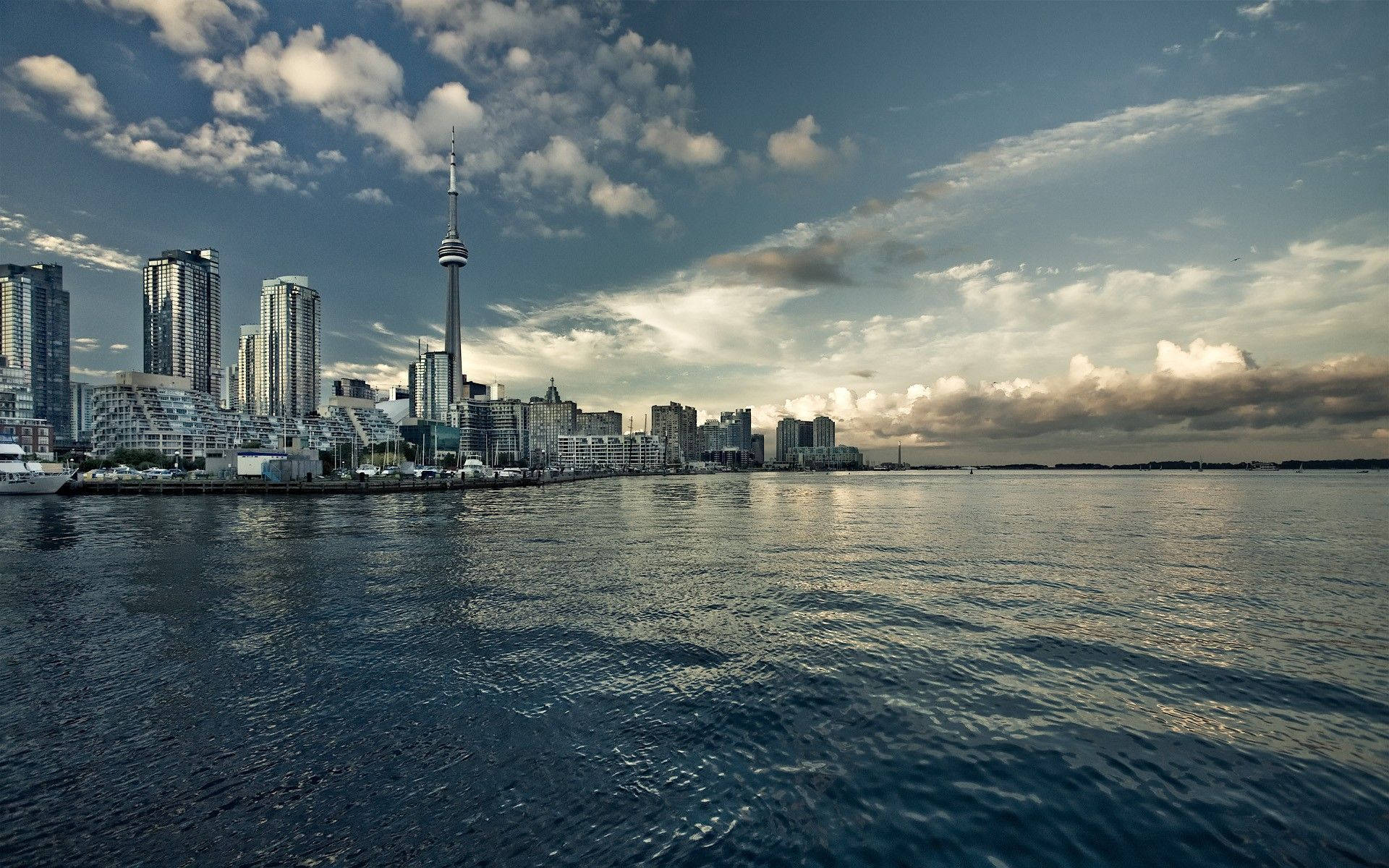 Ontario Buildings And Seaside View Background