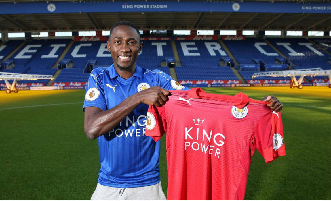 Onyinye Ndidi And Red Shirt Background