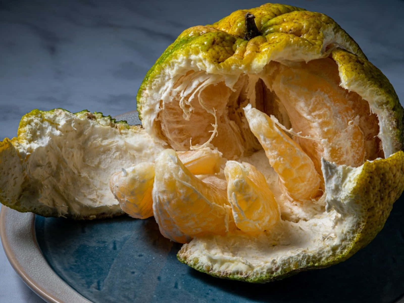 Open Lime Green Ugli Citrus Fruit Background