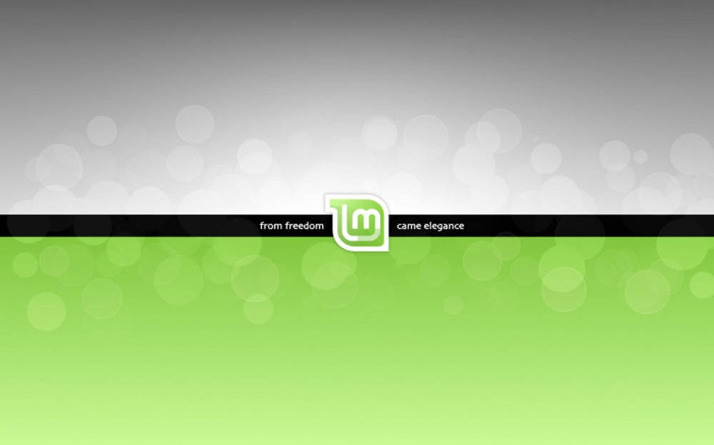Operating System Linux Mint With Slogan Background