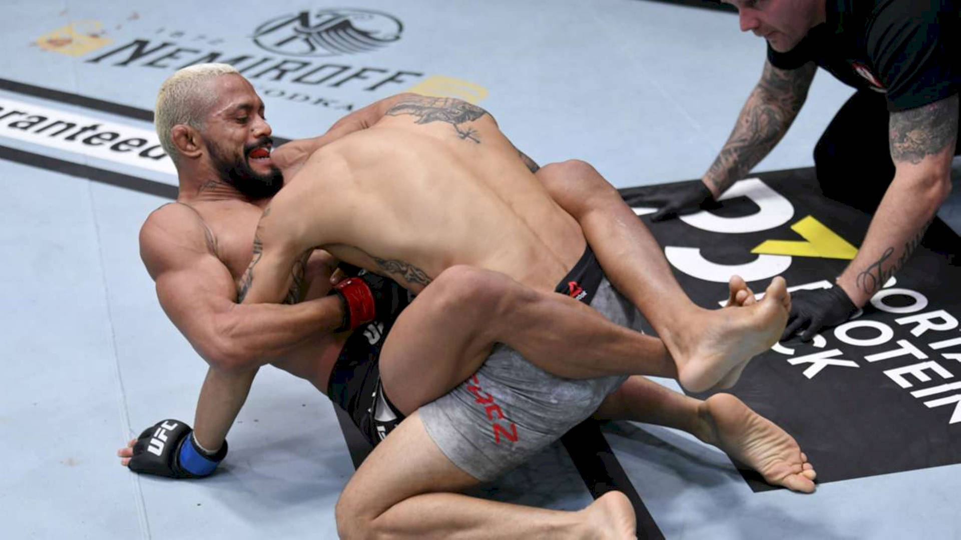 Opponent Tackling Deiveson Figueiredo Background