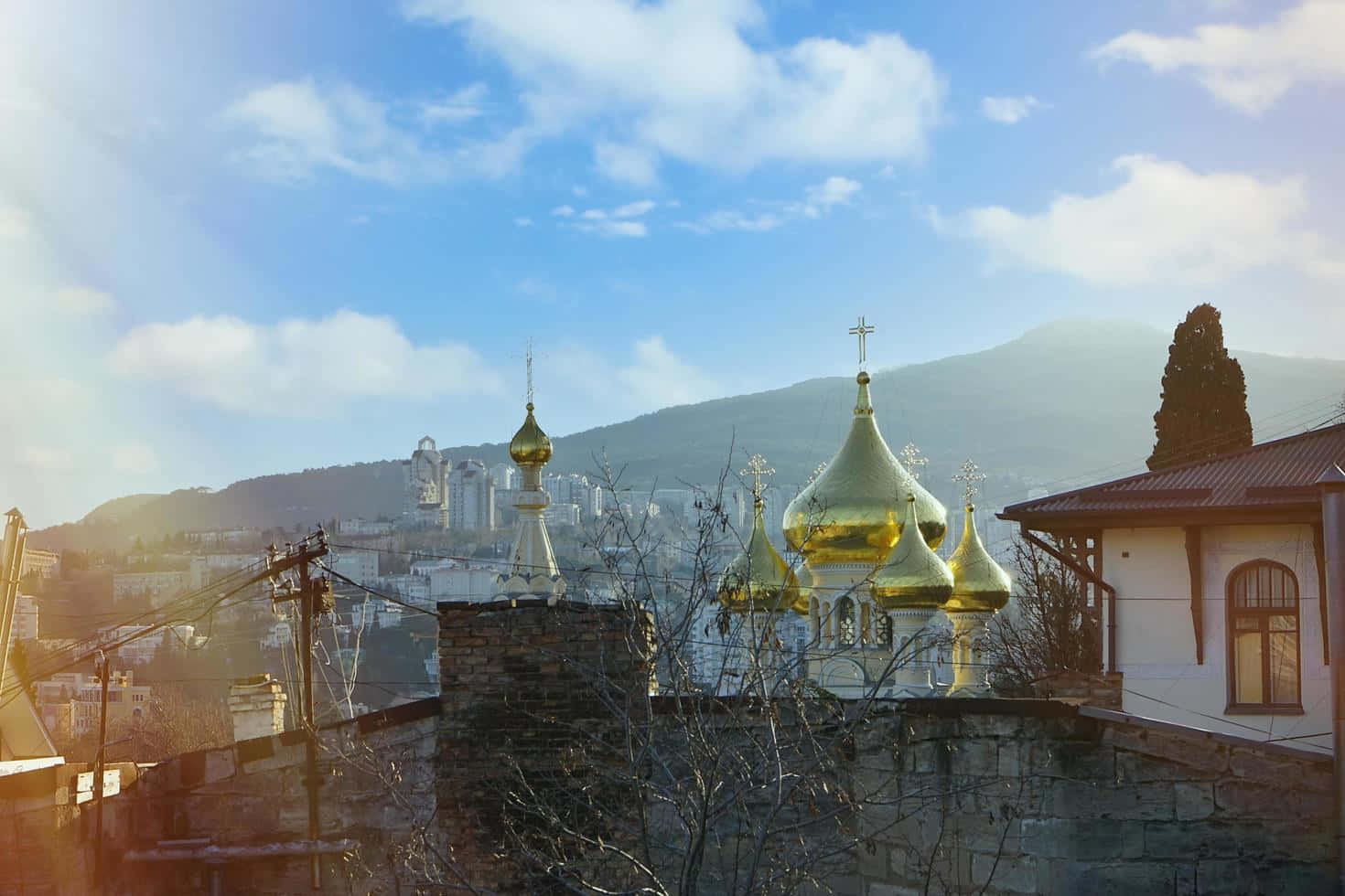 Opulent Gold Cathedral Towers Of Yalta Background