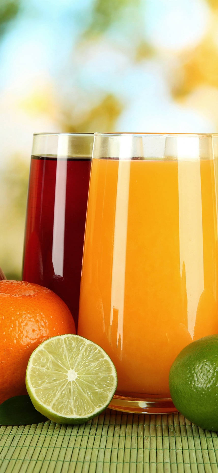 Orange And Lime Fruit Juices Background
