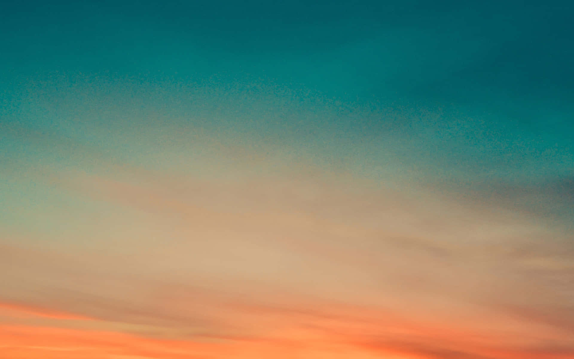 Orange And Teal Sunset Sky Background