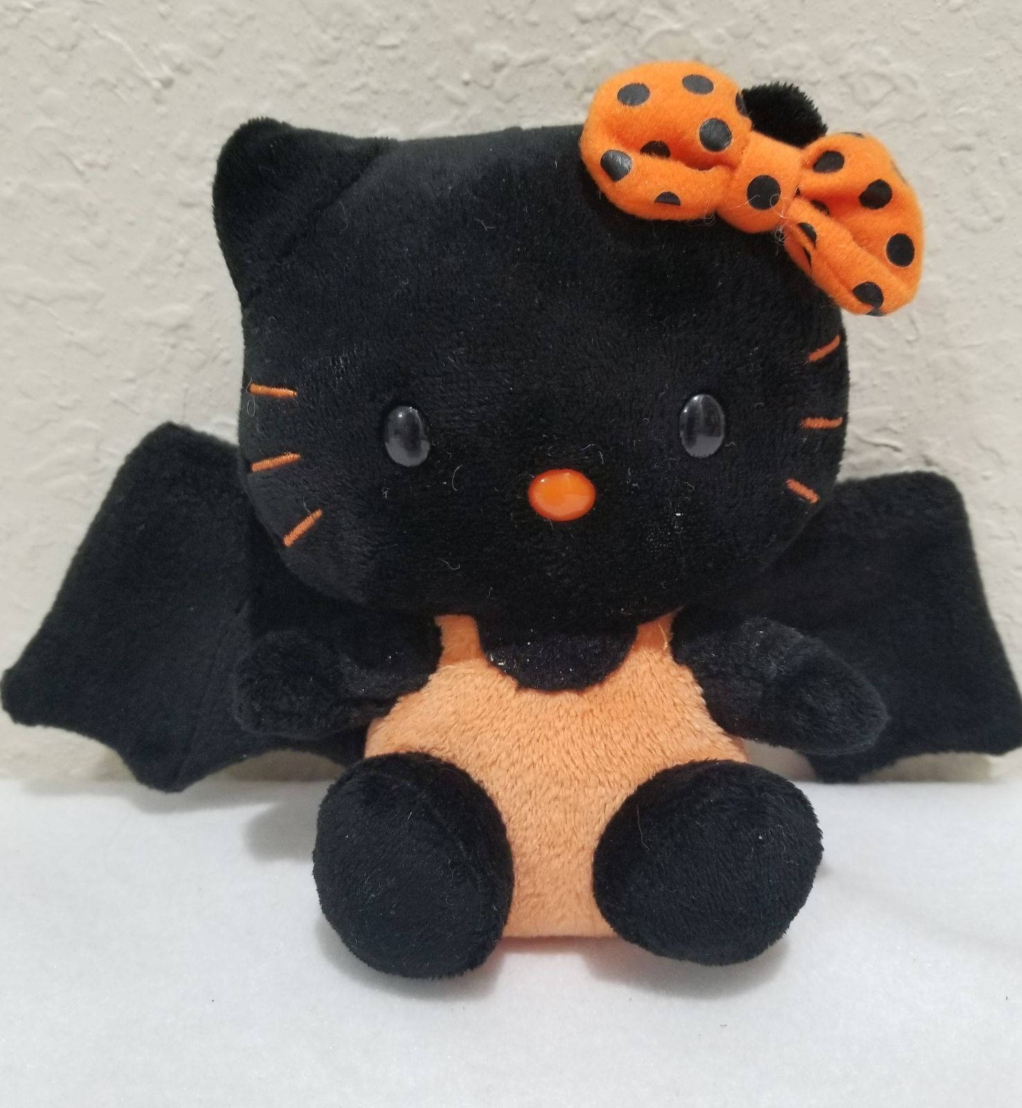 Orange-black Bat Hello Kitty Halloween Background