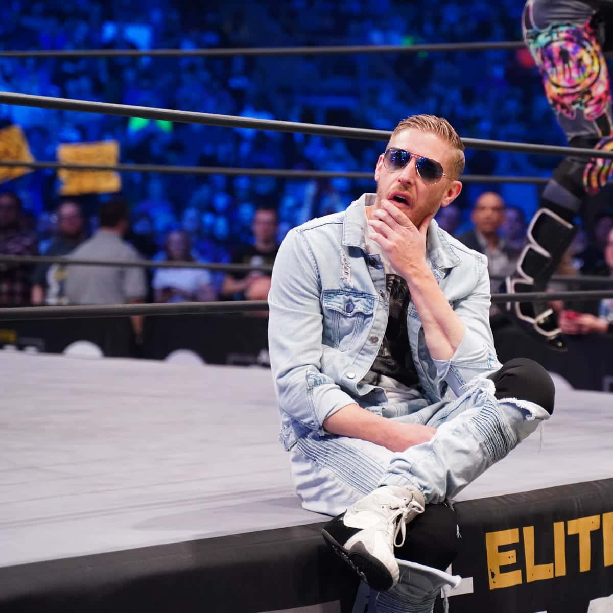 Orange Cassidy Sitting Onstage Background