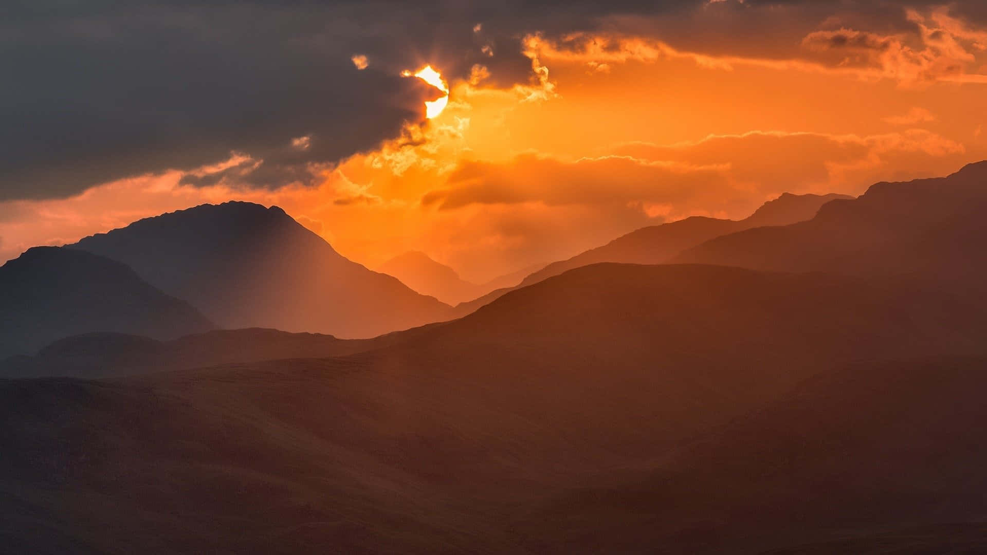 Orange Cloudy Mountains Sunset Landscape Background