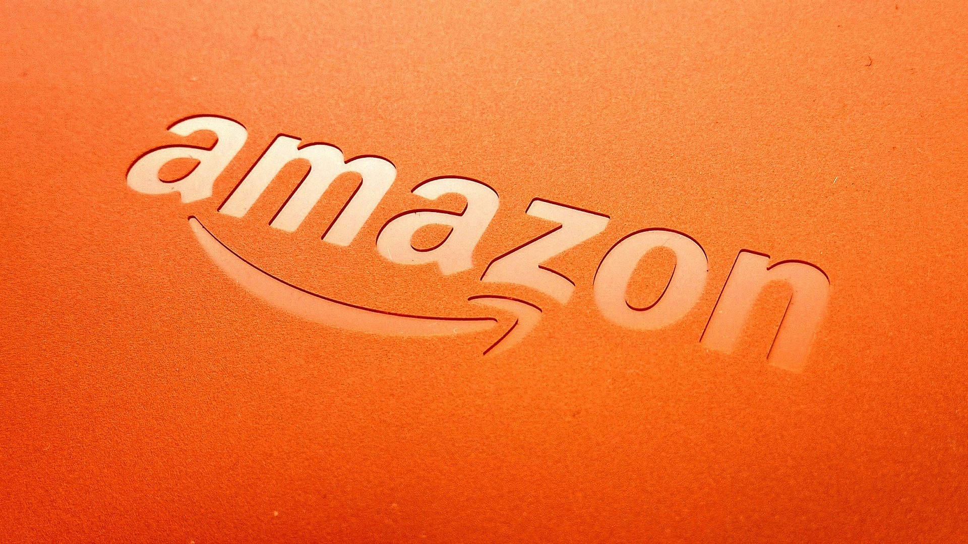 Orange Debossed Amazon Logo Background