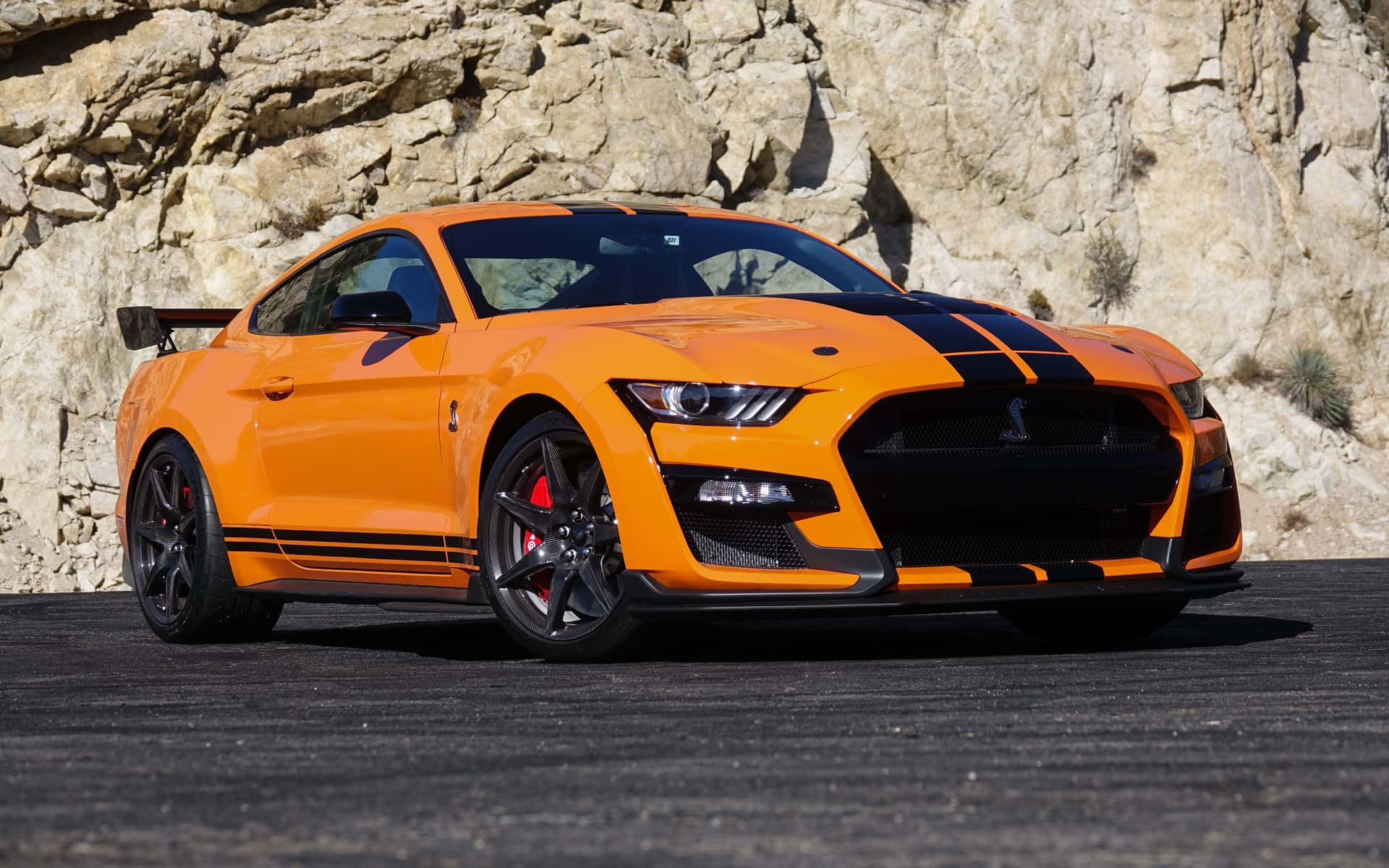 Orange Ford Mustang Shelby G T500 Parked