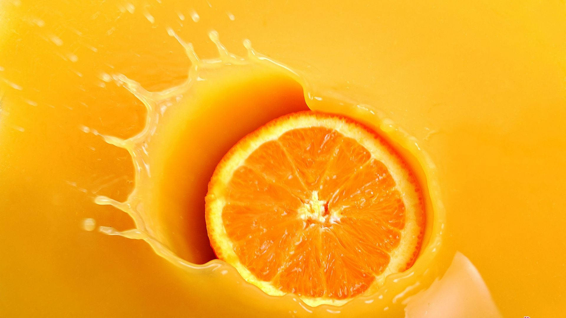 Orange Fruit Dunked In Juice Background