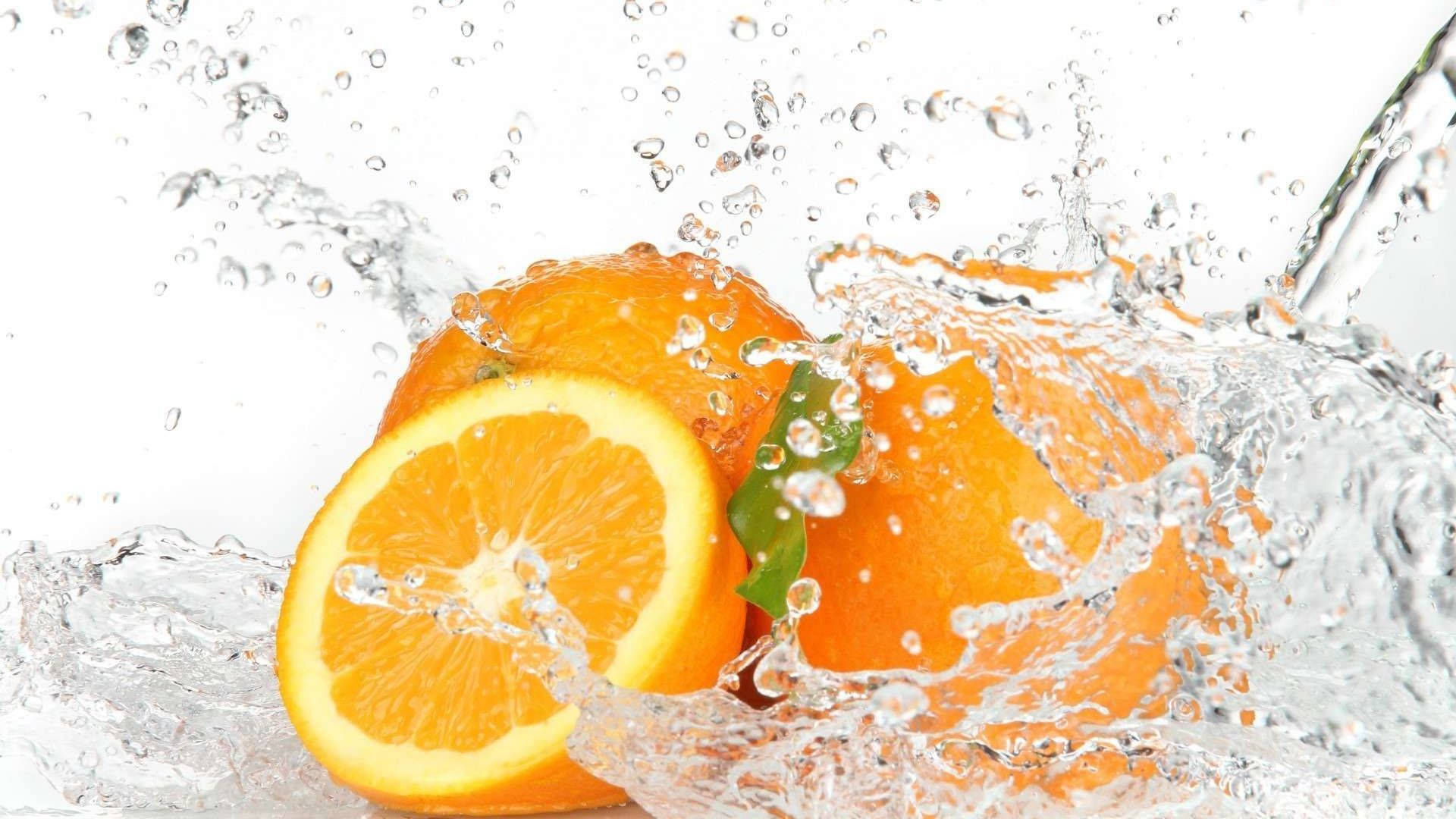 Orange Fruits In Water Background