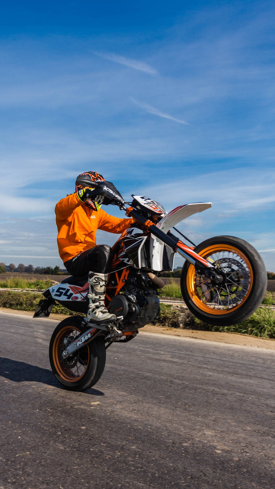 Orange Ktm 4k Biker On Track Background