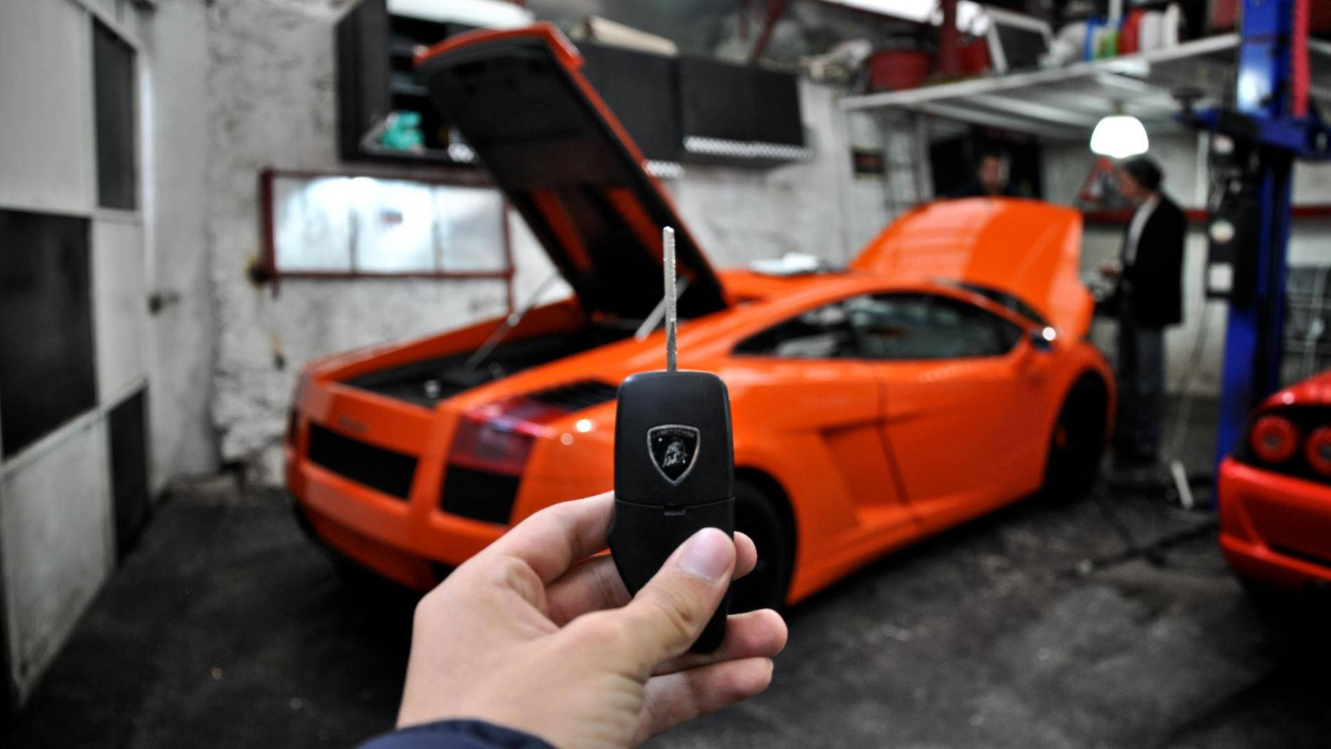 Orange Lamborghini Car Key Background