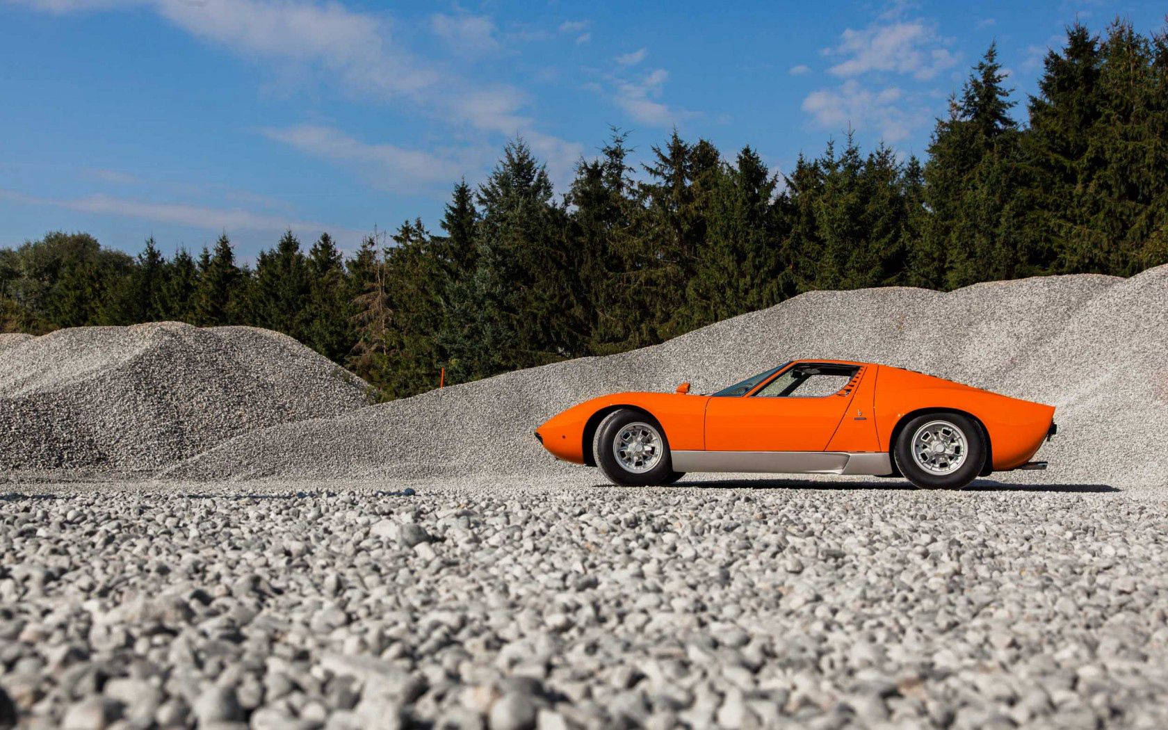 Orange Lamborghini Miura On Gravel