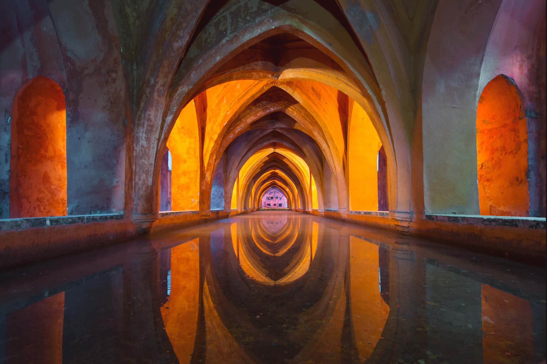 Orange Light Illuminating The Arch Background