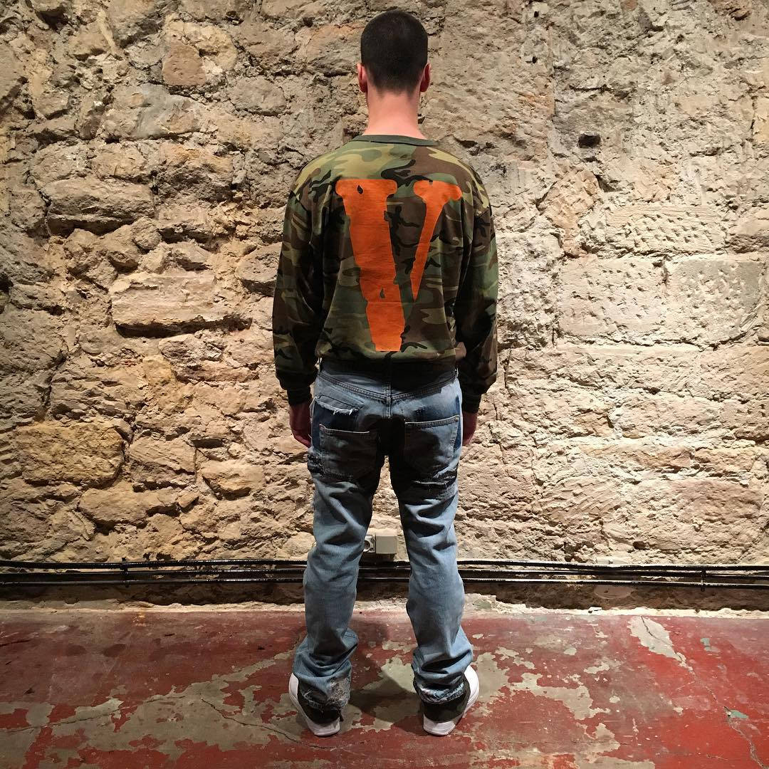 Orange Logo In Camouflage Vlone Pfp Background