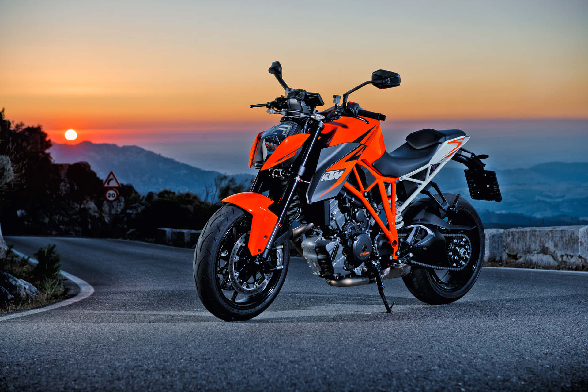 Orange Monster: A Stunning Shot Of A Ktm Motorbike Background