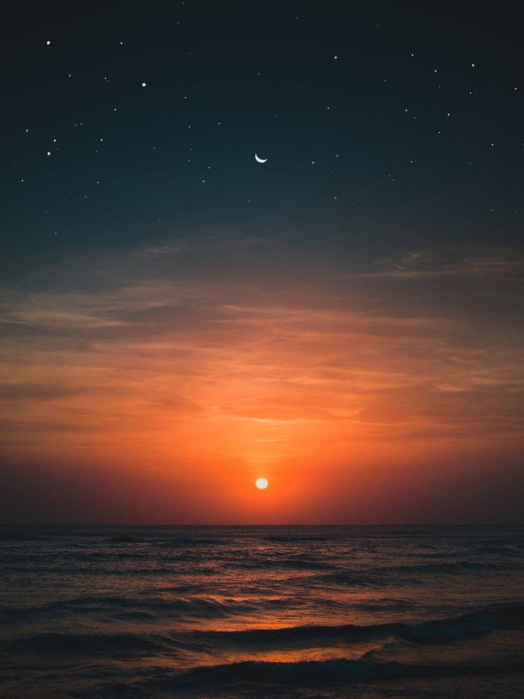 Orange Sun And Crescent Moon Background