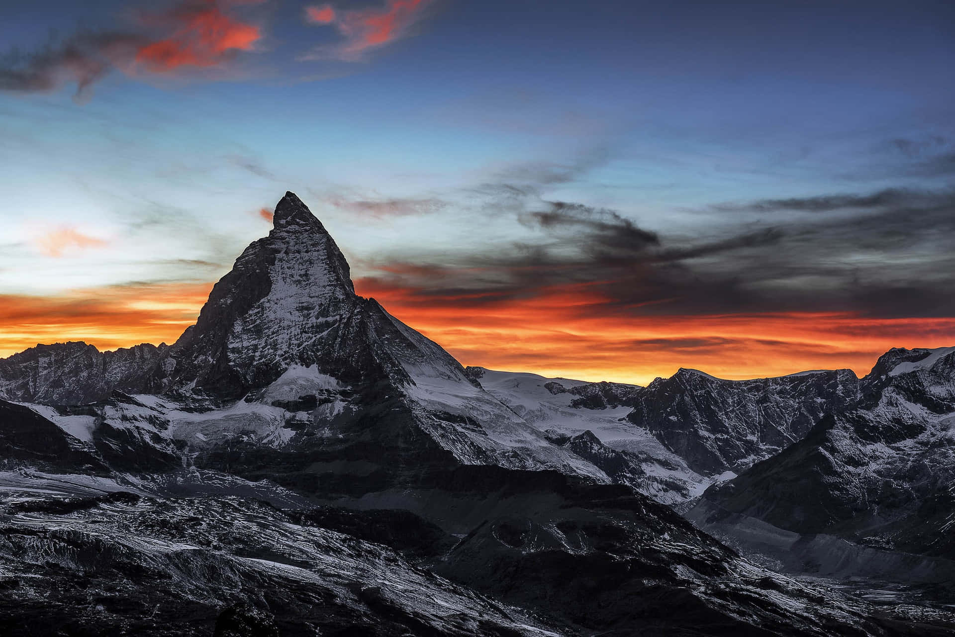Orange Sunset Sky Behind The Matterhorn Background