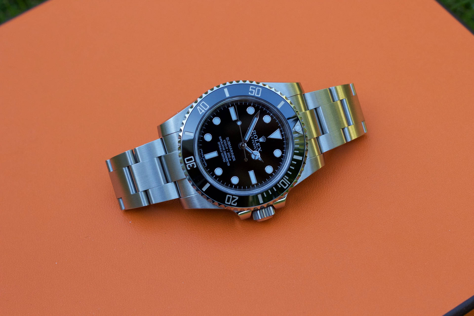 Orange Surface Rolex Background