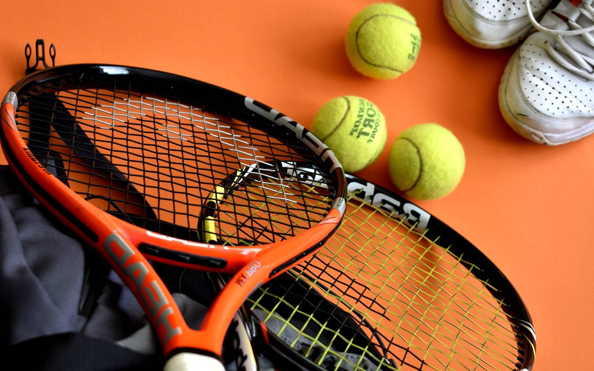 Orange Tennis Racket Background