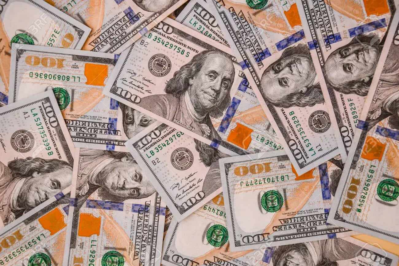 Orange-toned 100 Dollar Bill Pile Background