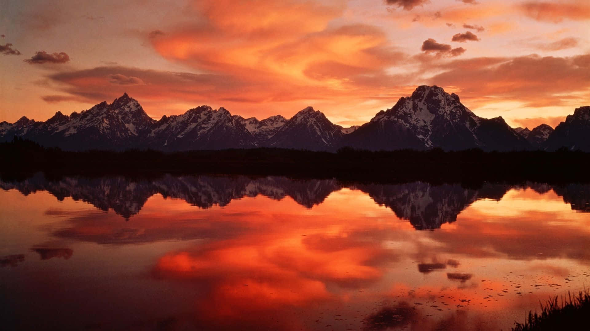 Orange Water Reflection Mountains Sunset Background