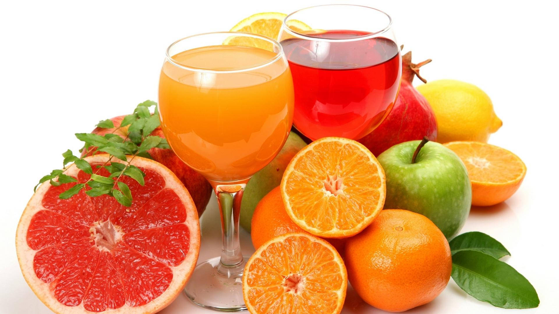 Oranges Grapefruits And Apple Drinks Background