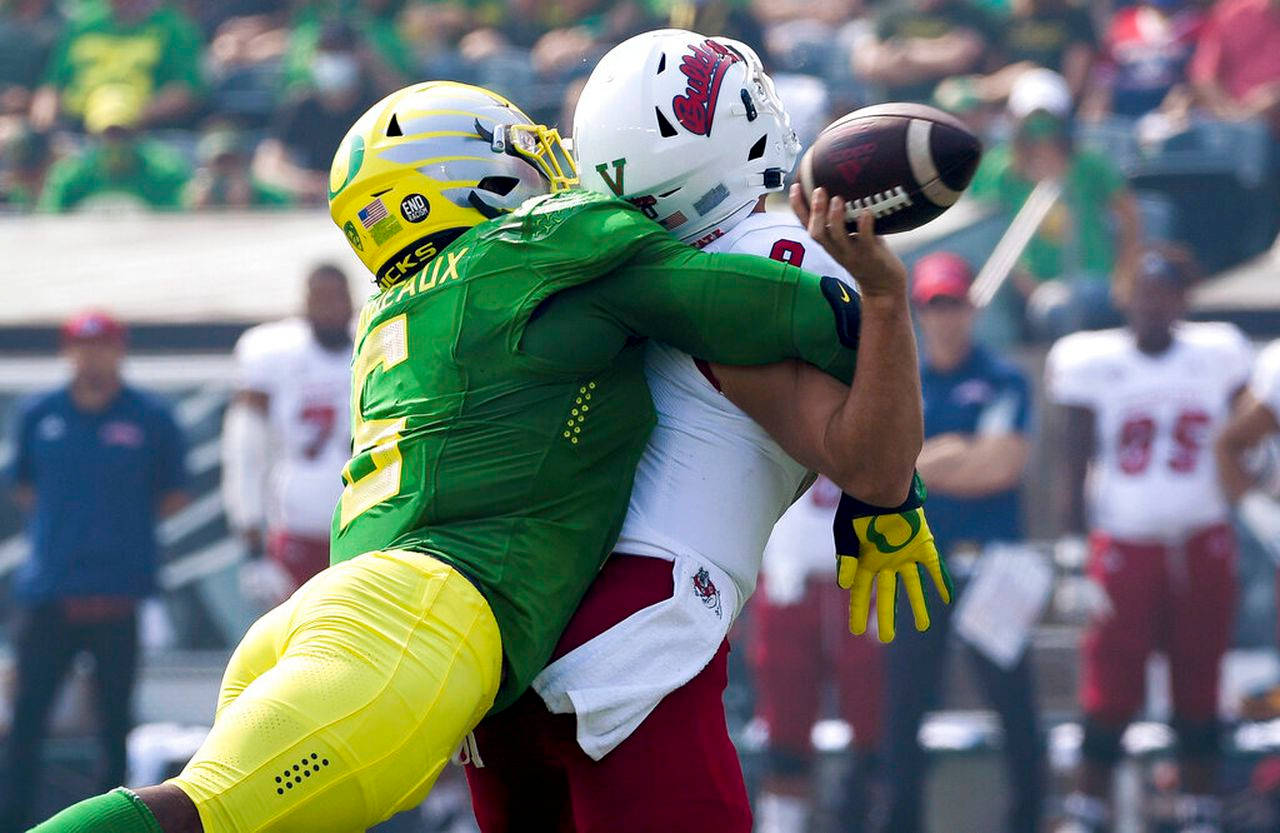 Oregon Star Defensive End Kayvon Thibodeaux Background