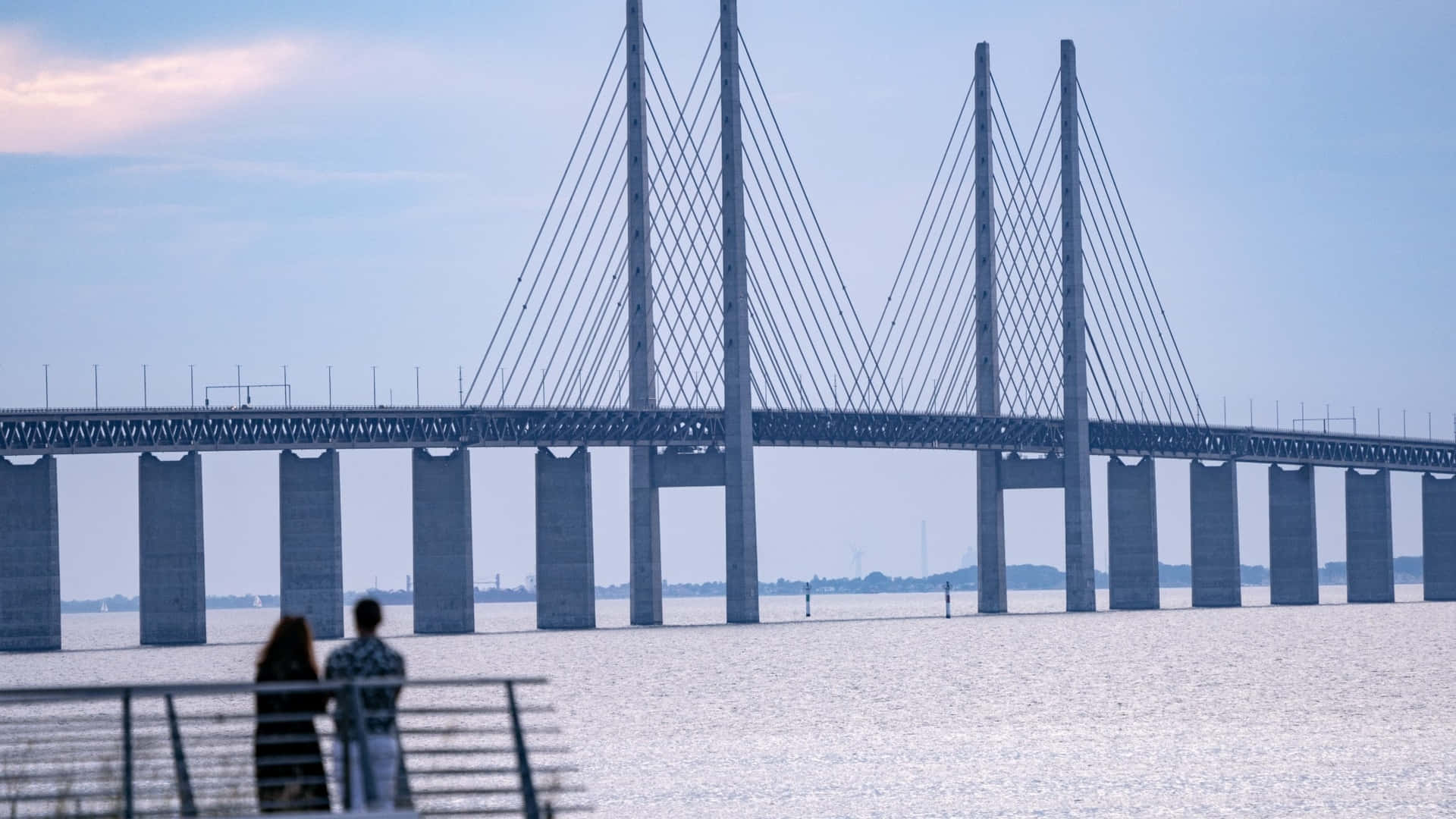 Oresund Bridge Romantic Ocean View Couple Background