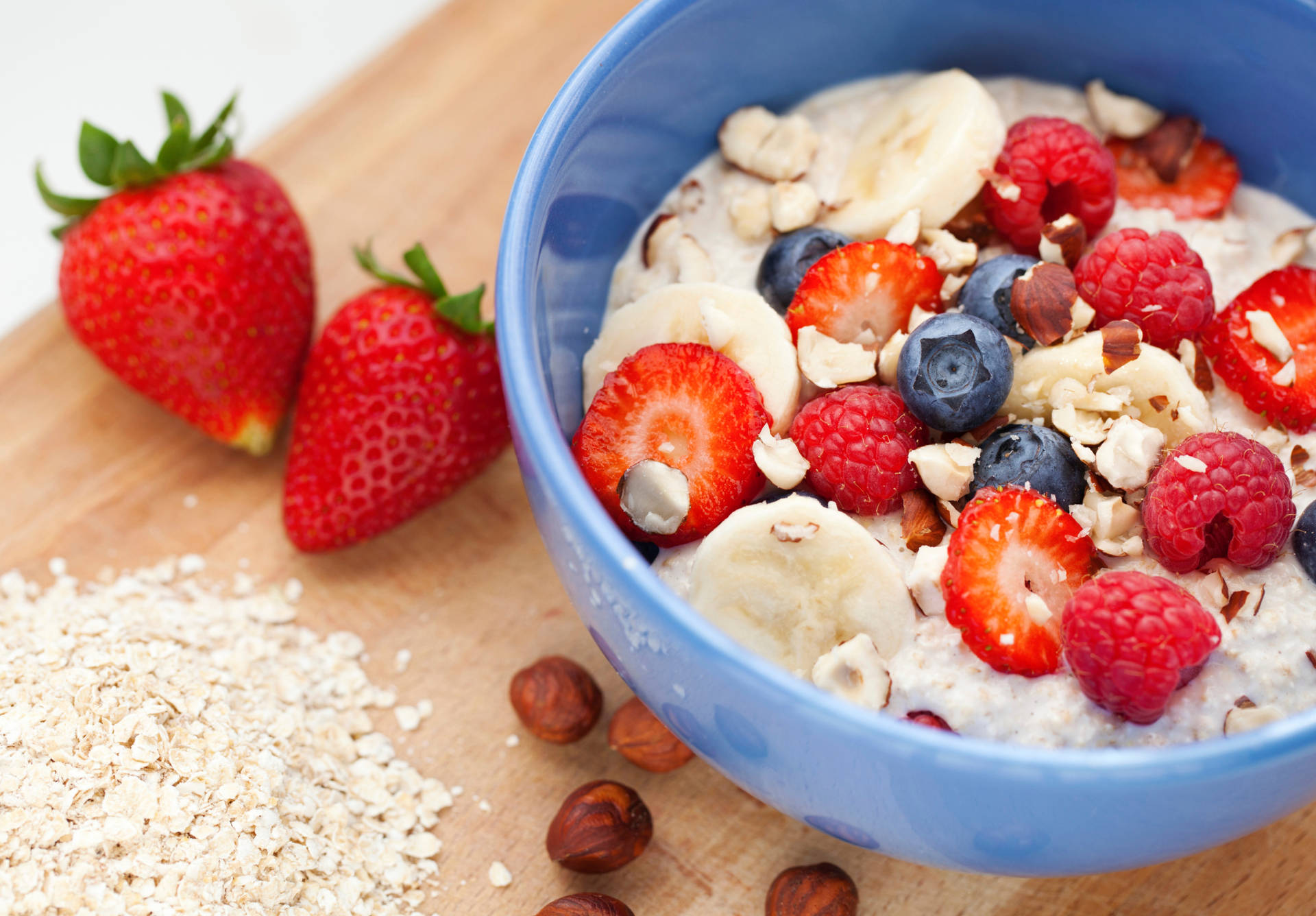 Organic Oatmeal Porridge Garnished With Fresh Berries Background