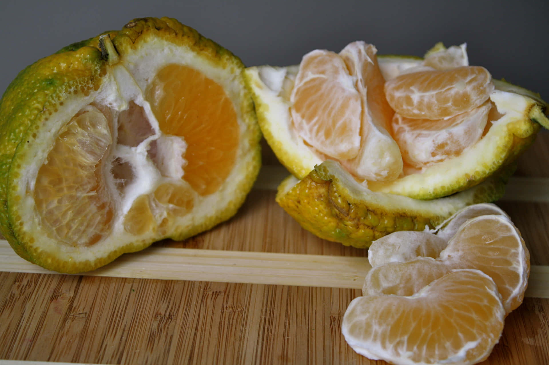 Organic Peeled Ugli Citrus Fruit Background