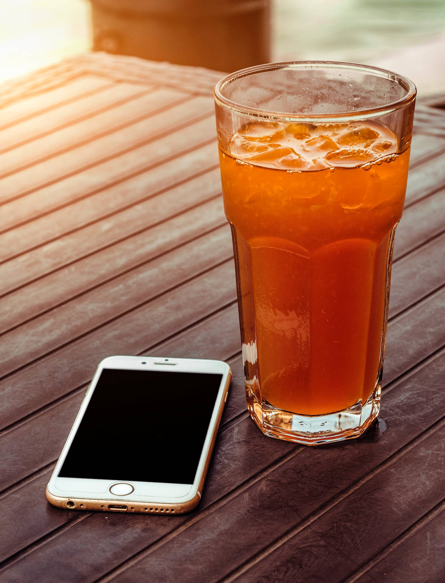 Original Iphone 6 And Orange Juice Background
