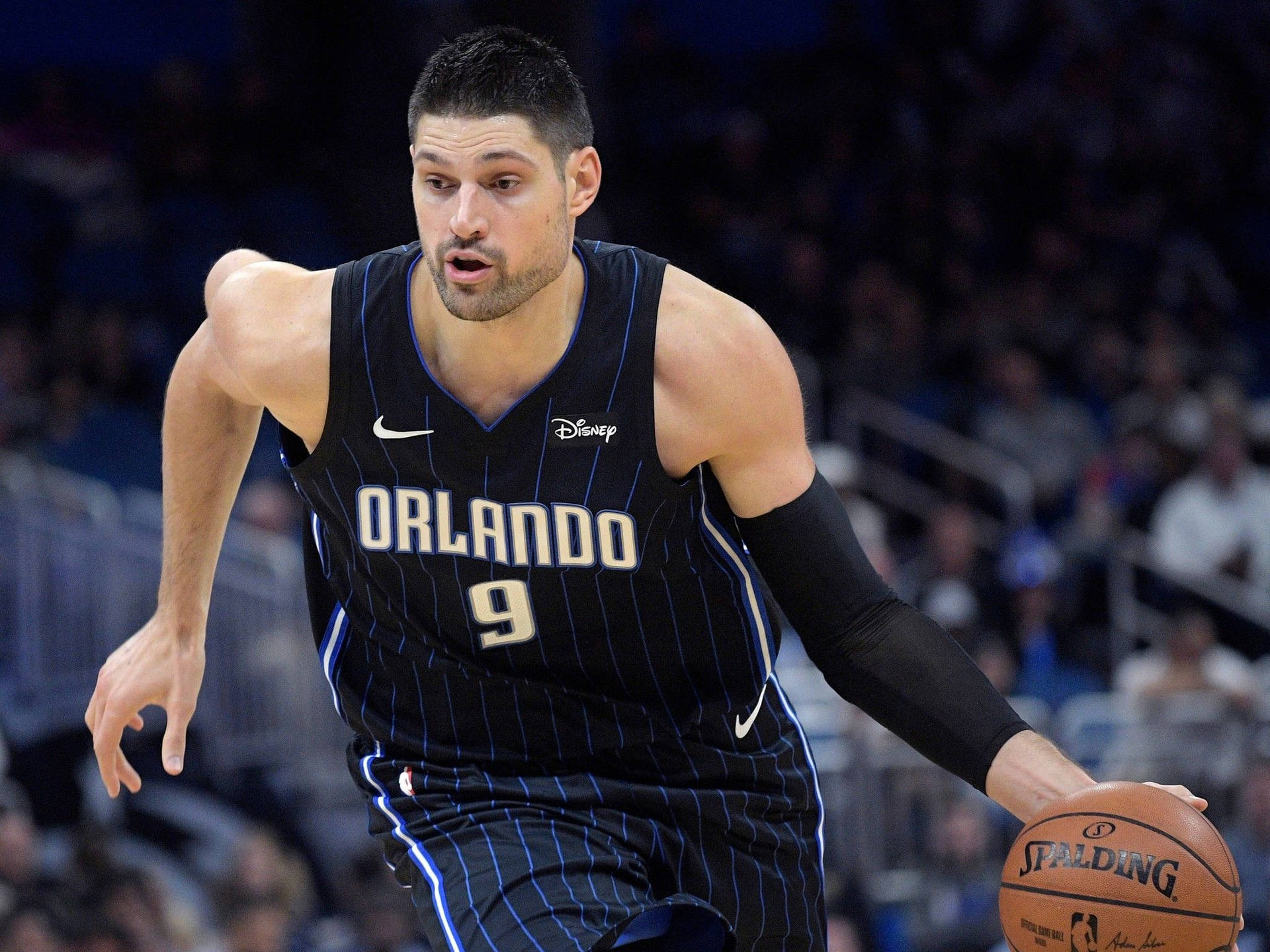 Orlando Magic Nba Player Nikola Vucevic Powerful Center Background