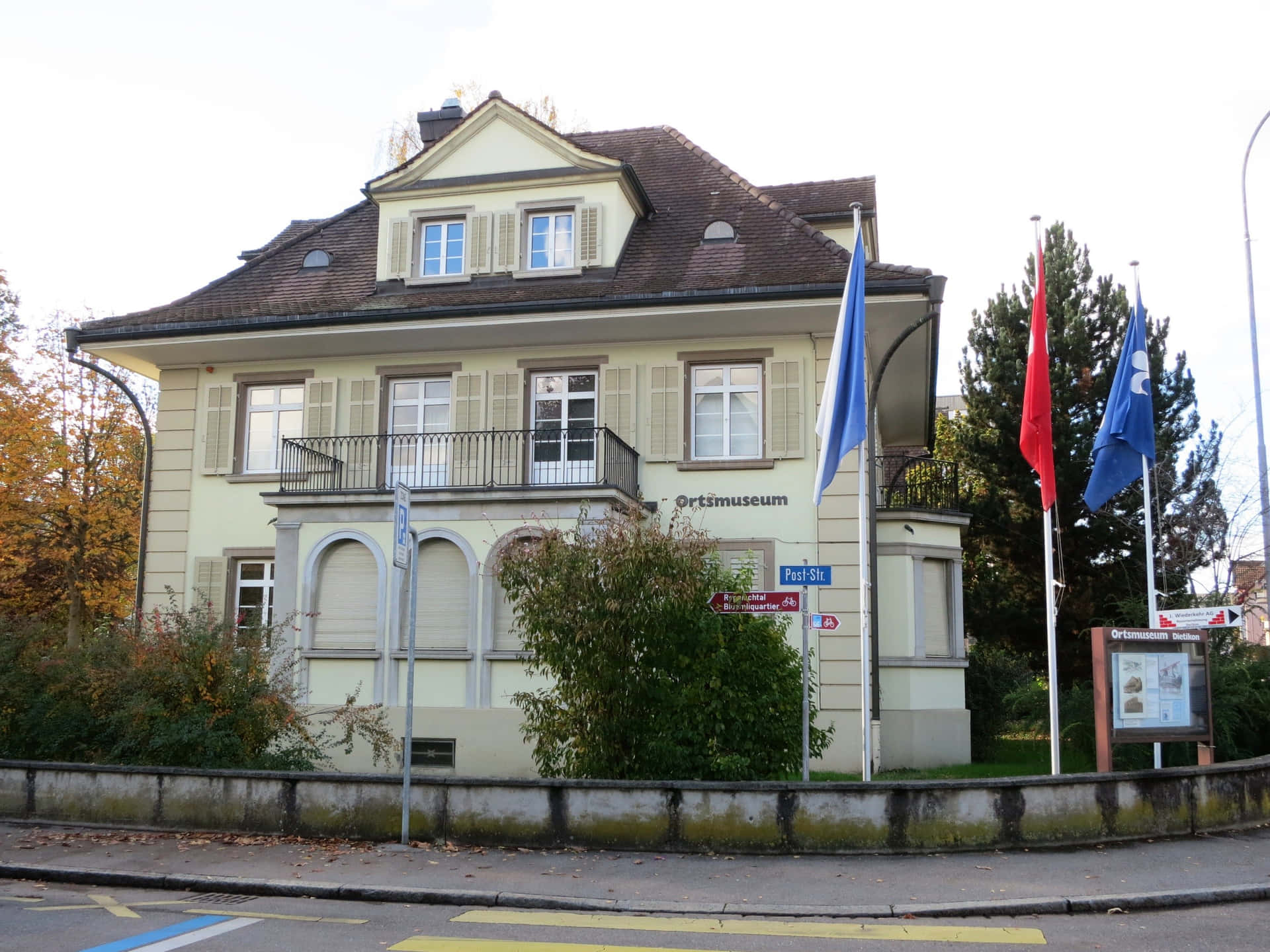 Ortsmuseum_ Dietikon_ Building_with_ Flags Background